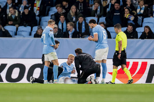 Otto Rosengren of Malmö FF receives medical attention