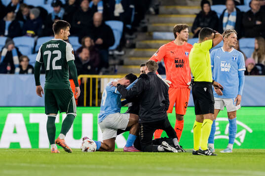 Sead Haksabanovic of Malmö FF receives medical attention