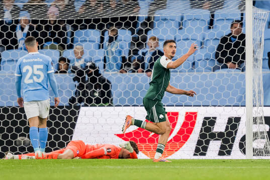 Filip Djurisic of Panathinaikos celebrates and goalkeeper
