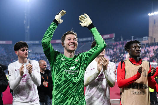 Goalkeeper Mathias Dyngeland of Brann celebrates