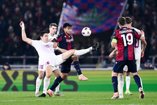 Eivind Helland of Brann and Santiago Castro of Bologna