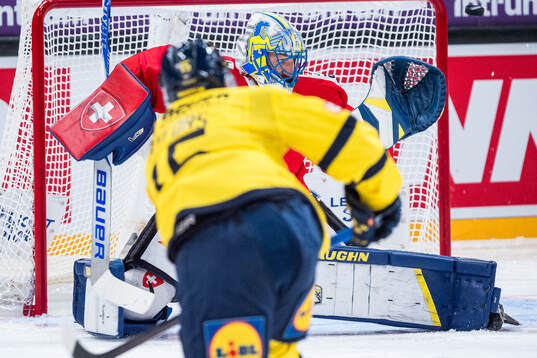 Goaltender Sandro Aeschlimann of Switzerland