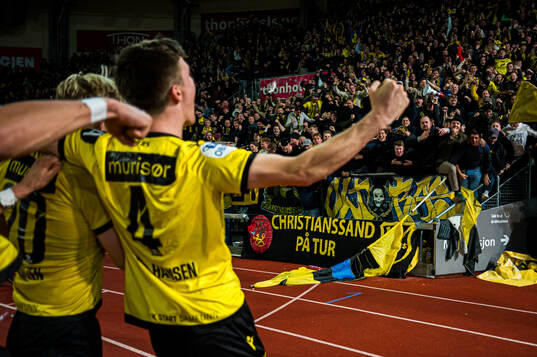 Spectators in the stands celebrates