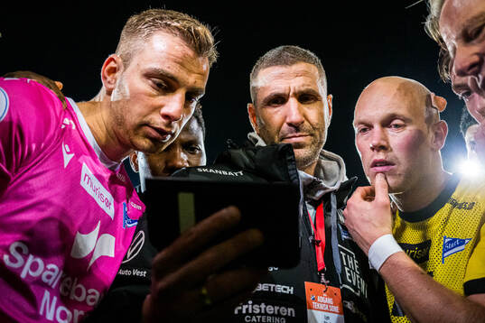 Goalkeeper Jacob Pryts Larsen, head coach Azar Karadas and