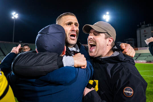 Head coach Azar Karadas of Start celebrates promotion to