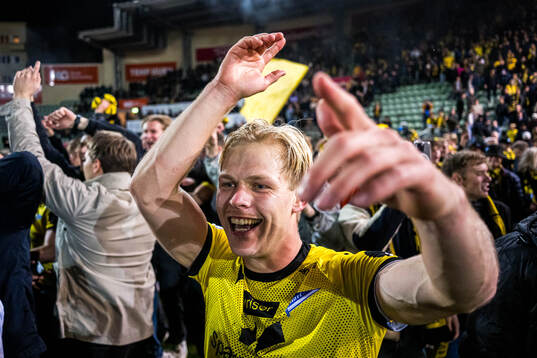 Håkon Holmefjord Lorentzen of Start celebrates promotion