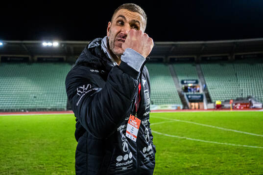 Head coach Azar Karadas of Start celebrates promotion to