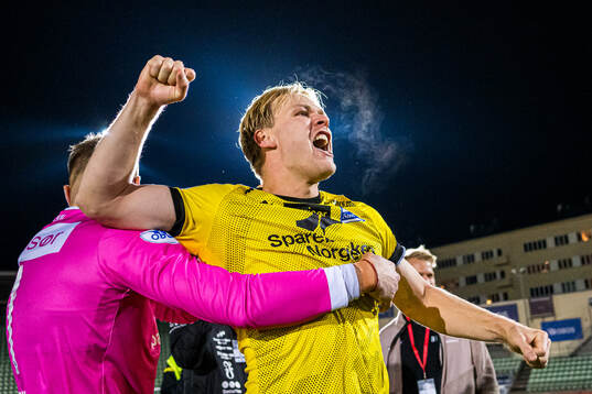 Håkon Holmefjord Lorentzen of Start celebrates promotion