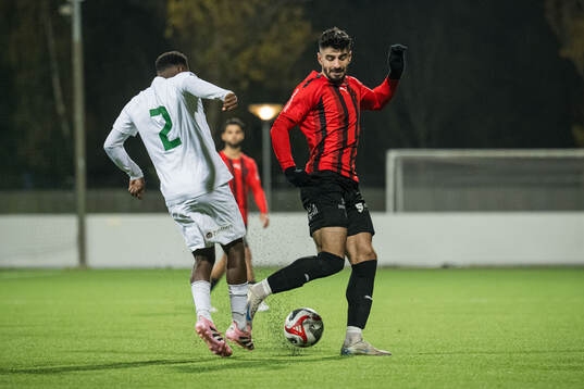 FC Arlandas Leonard Kleist och Nordic United FCs Shergo