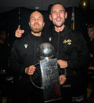 Mjällbys Viktor Gustafson och Adam Petersson jublar med