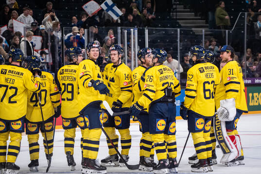 Players of Sweden celebrate