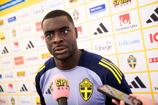 Ken Sema of the Swedish national football team talking to