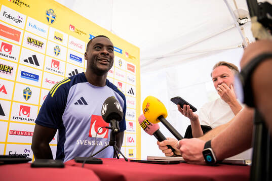 Ken Sema of the Swedish national football team talking to
