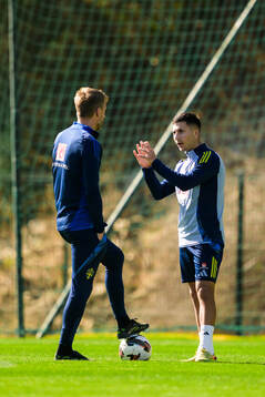 Head coach Graham Potter and Roony Bardghji of the Swedish