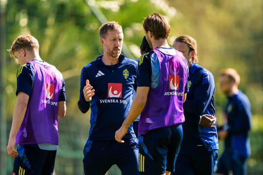 Head coach Graham Potter greets players of the Swedish