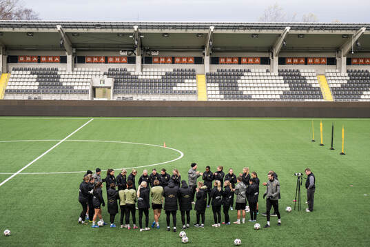 Players and coaches gather