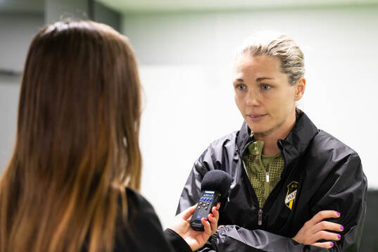 Goalkeeper Jennifer Falk is interviewed