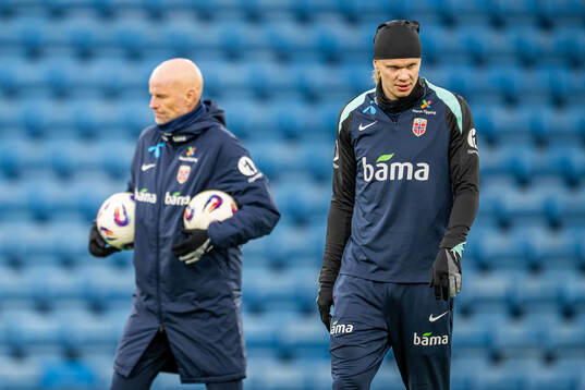 Head coach Ståle Solbakken and Erling Braut Haaland of the
