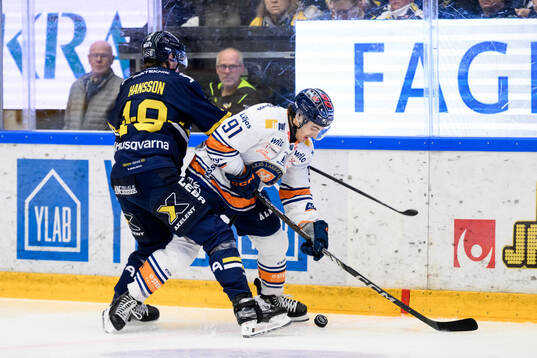 HV71s Niklas Hansson och Växjös Felix Robert