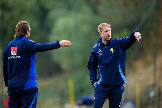 Assistant coach Björn Hamberg and head coach Graham Potter