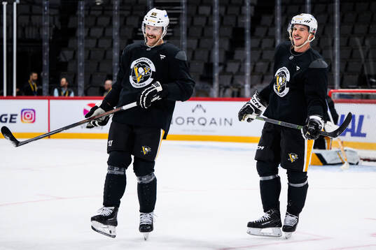 Erik Karlsson and Sidney Crosby