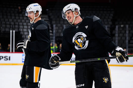 Erik Karlsson and Sidney Crosby
