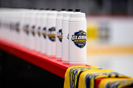 Water bottles with the NHL Global Series logotype