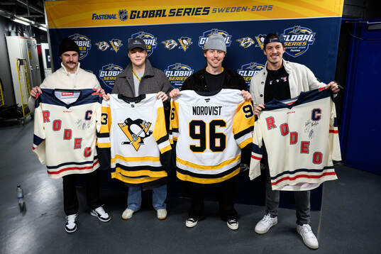 Erik Karlsson and Rickard Rakell of Pittsburgh Penguins