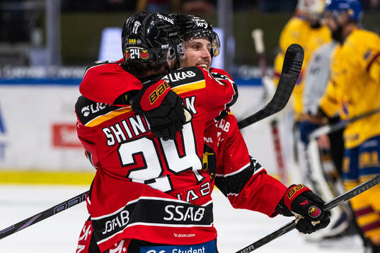 Luleås Brendan Shinnimin och Mathias Bromé jublar