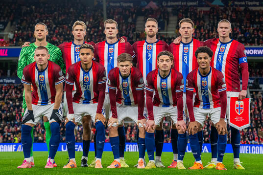 The starting eleven of Norway pose for a team photo