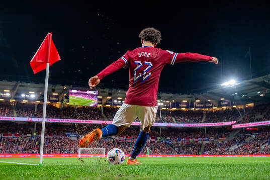 Oscar Bobb of Norway takes a corner kick