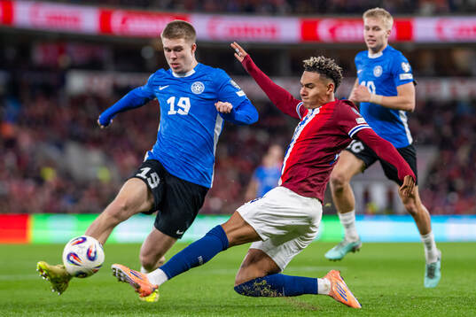 Michael Schjønning-Larsen of Estonia and Antonio Nusa of