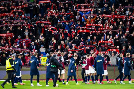 Spectators in the stands celebrates