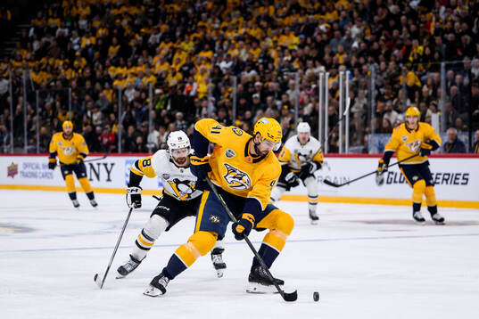 Tommy Novak of Pittsburgh Penguins and Nicolas Hague of