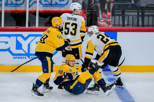 Michael Bunting and Fedor Svechkov of Nashville Predators