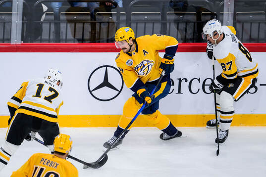 Filip Forsberg of Nashville Predators and Sidney Crosby of