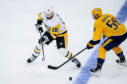 Tommy Novak of Pittsburgh Penguins and Michael Bunting of