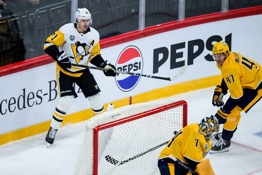 Evgeni Malkin of Pittsburgh Penguins scores the 1-0 goal