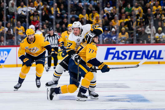 Sidney Crosby of Pittsburgh Penguins and Luke Evangelista
