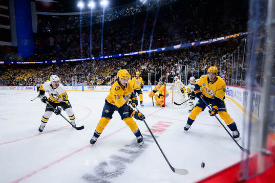 Sidney Crosby of Pittsburgh Penguins with Luke Evangelista