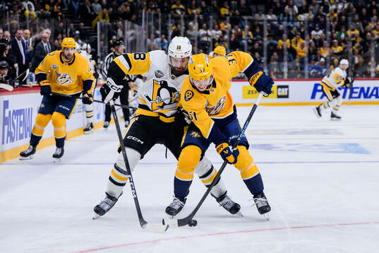 Tommy Novak of Pittsburgh Penguins and Nick Blankenburg of