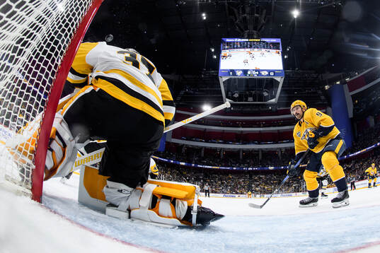 goalkeeper Arturs Silovs of Pittsburgh Penguins and Filip