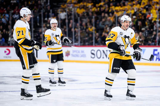 Evgeni Malkin, Erik Karlsson and Sidney Crosby of