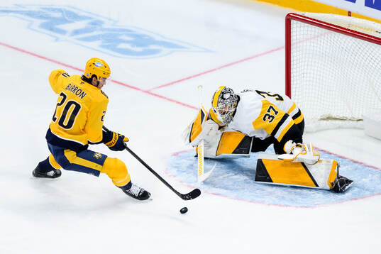 Justin Barron of Nashville Predators and goalkeeper Arturs