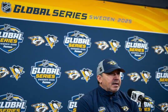 Head coach Andrew Brunette at a press conference