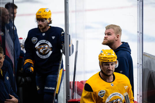 Equipment manager Benny Boquist at a practice session with