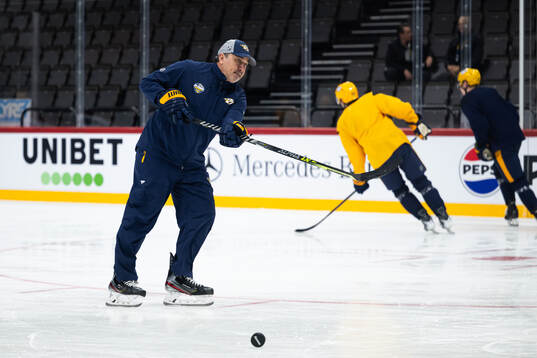 Head coach Andrew Brunette at a practice session with