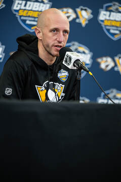 Head coach Dan Muse at a press conference