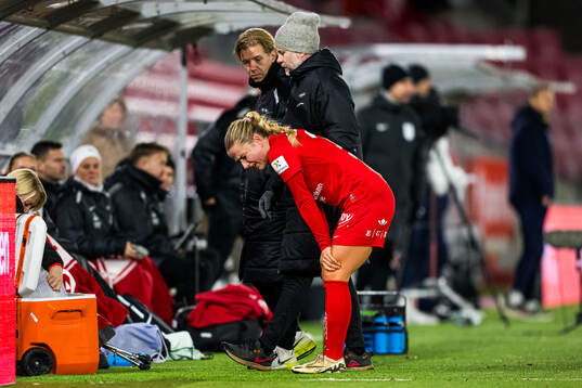 Monica Isaksen of Brann in pain