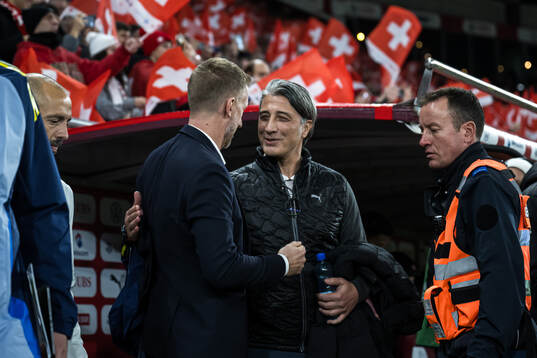 Head coach Graham Potter of Sweden and Head coach Murat